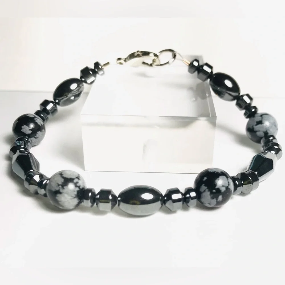 Beautiful handmade snowflake obsidian and hematite bracelet. - Picture 1 of 2